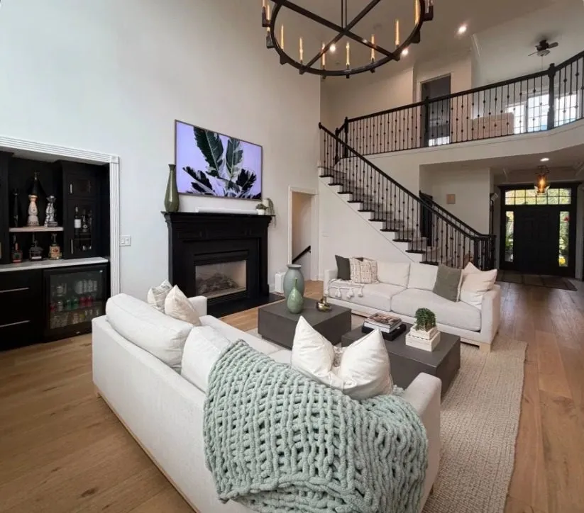 Great room with staircase and balcony